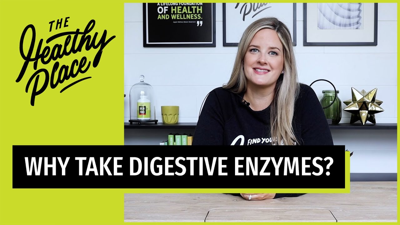 Smiling blonde woman in a 'Find Your Healthy Place' shirt sits at a table with a wellness-themed background. Bold text reads 'WHY TAKE DIGESTIVE ENZYMES?'