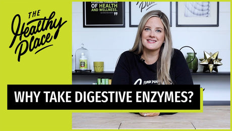 Smiling blonde woman in a 'Find Your Healthy Place' shirt sits at a table with a wellness-themed background. Bold text reads 'WHY TAKE DIGESTIVE ENZYMES?'