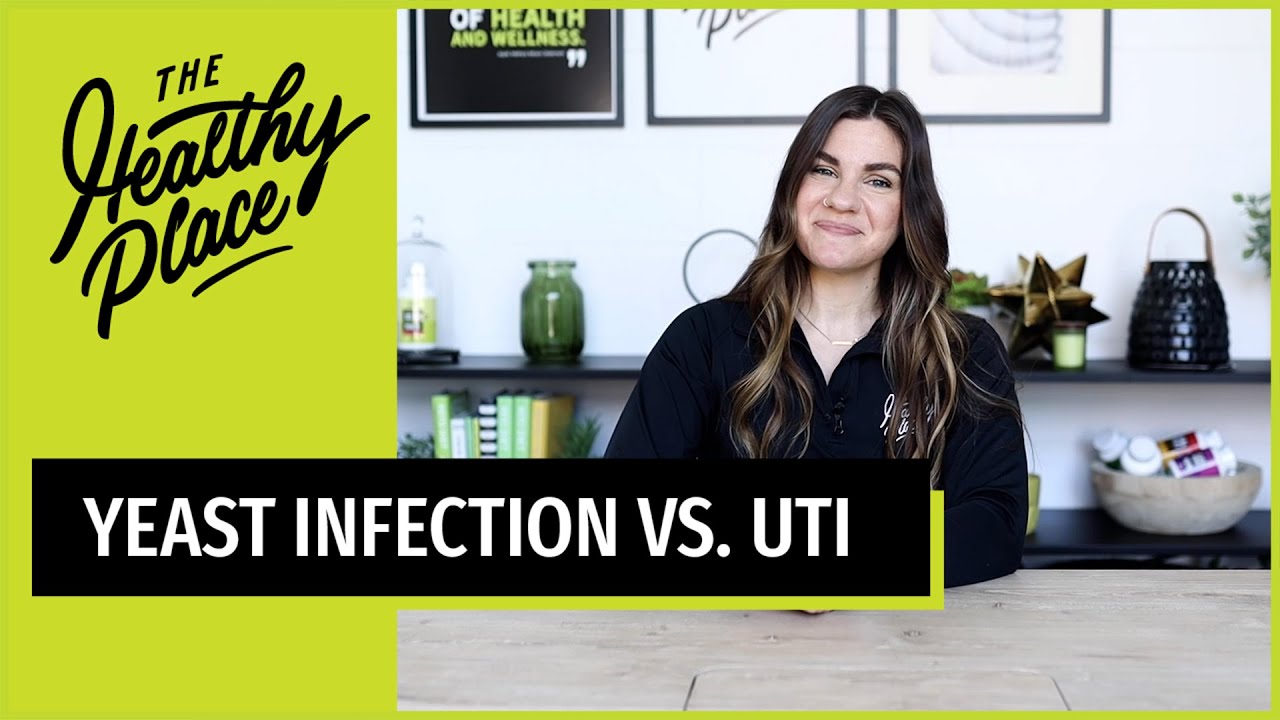 A video thumbnail from "The Healthy Place" featuring a woman at a table with bold text reading "YEAST INFECTION VS. UTI" and the brand’s logo on a lime green background.