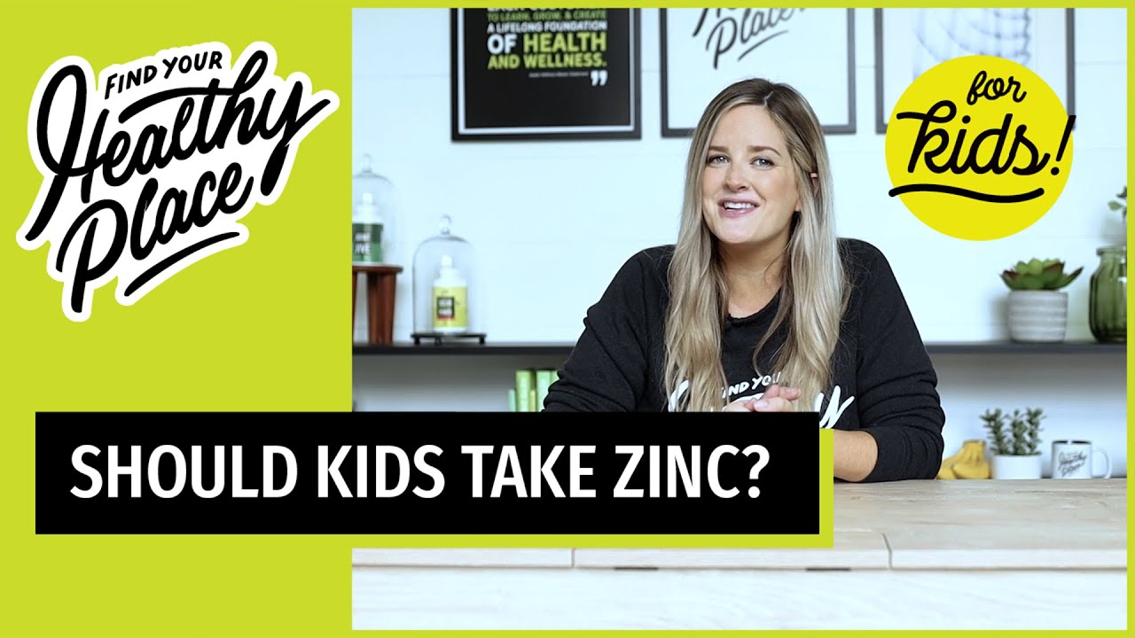 A woman discusses zinc for kids, with "The Healthy Place" branding and a "for kids!" badge. The text overlay asks, "Should kids take zinc?"