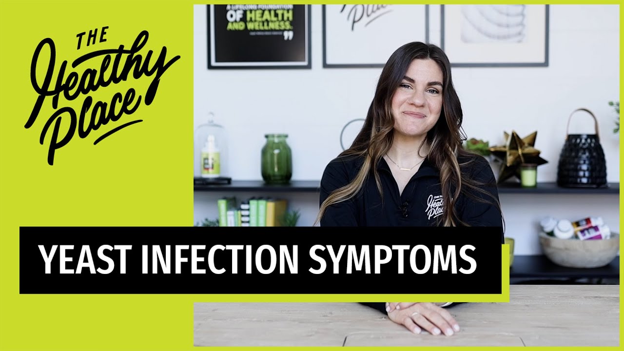 A woman in a black 'Find Your Healthy Place' jacket sits at a table with a wellness-themed background. Text overlay reads 'FAST YEAST INFECTION SOLUTIONS.'