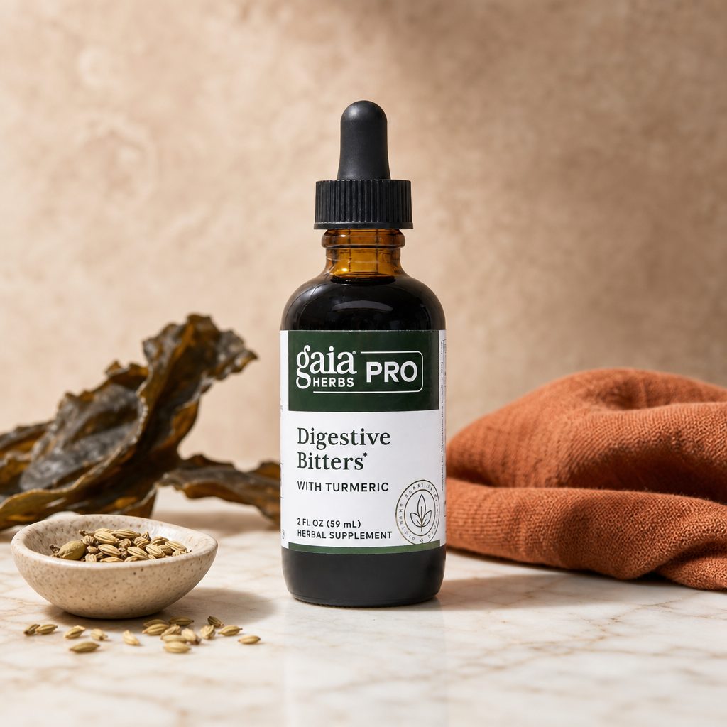 Gaia Herbs Pro Digestive Bitters with Turmeric bottle with water glass before a meal