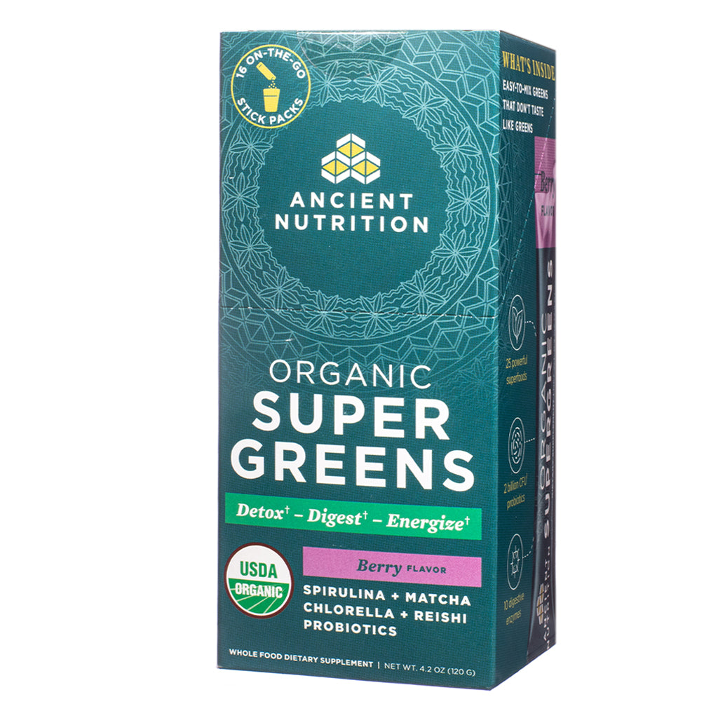 The front label of Ancient Nutrition Organic SuperGreens Berry 4.2 oz Stick Packs highlights key benefits like detox, digestion, and energy, with USDA Organic seal and featured ingredients like spirulina, matcha, chlorella, reishi, and probiotics.