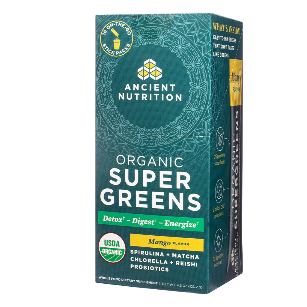 The front label of Ancient Nutrition Organic SuperGreens Mango 4.3 oz Stick Packs highlights the mango flavor, USDA Organic certification, and product benefits like detox, digestion, and energy. Features key ingredients including spirulina, matcha, and probiotics.
