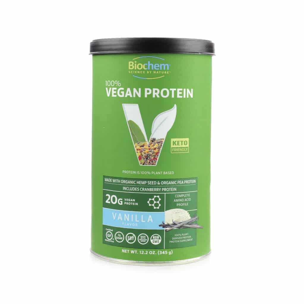 Image of a green container of BioChem Vegan Protein powder with vanilla flavor, featuring 20g of plant-based protein per serving from organic hemp seed, pea protein, and cranberry protein. The label notes it's keto-friendly, non-GMO, soy-free, gluten-free, and includes a complete amino acid profile.