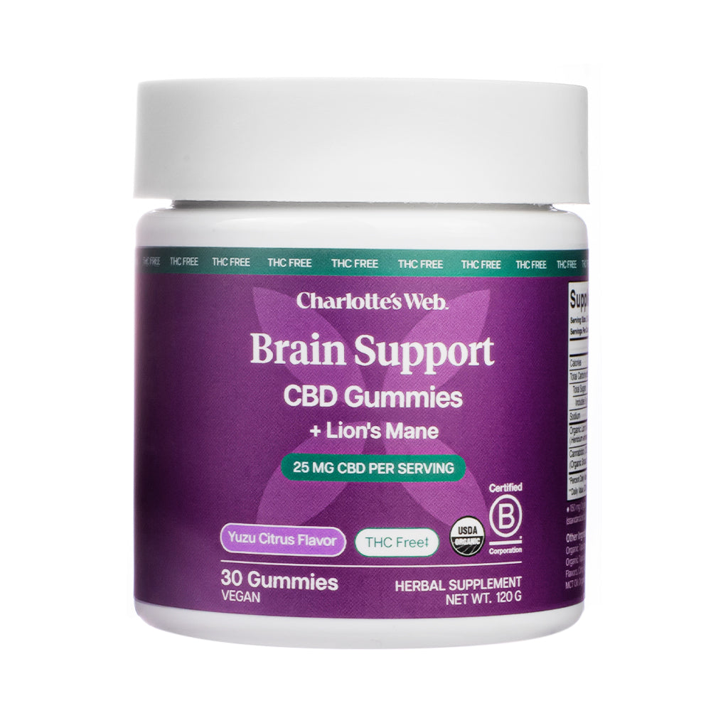 Purple and white jar of Charlotte’s Web Brain Support CBD Gummies with Lion’s Mane, featuring 25 mg CBD per serving, Yuzu Citrus Flavor, and labeled as THC Free with 30 vegan gummies.