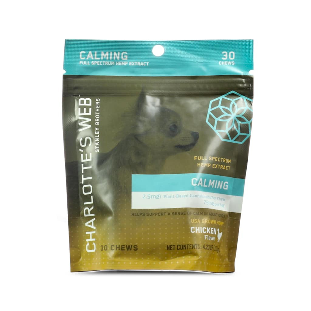 Resealable pouch of Charlotte’s Web Calming Chews for Dogs with full-spectrum hemp extract. Contains 30 chicken-flavored chews, each with 2.5 mg plant-based cannabinoids; total 75 mg per bag. Features an image of a small dog and turquoise and gold packaging.