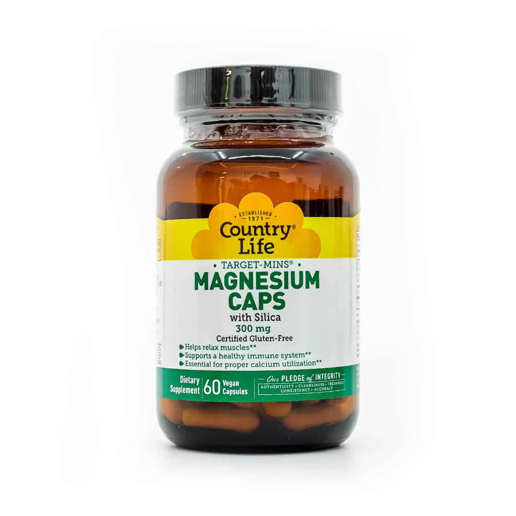 Bottle of Country Life Magnesium Caps with Silica, labeled as Target-Mins, containing 60 vegan capsules at 300 mg each. Claims to help relax muscles, support a healthy immune system, and aid calcium utilization; certified gluten-free.