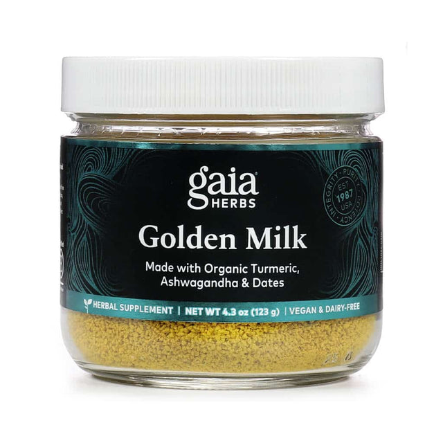 Gaia Herbs Golden Milk herbal supplement in a 4.3 oz (123 g) glass jar with a white lid, featuring a dark teal label. Made with organic turmeric, ashwagandha, and dates, this vegan and dairy-free powder supports wellness with traditional Ayurvedic ingredients.