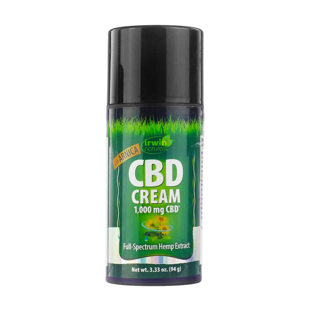A bottle of Irwin Naturals CBD Cream with Arnica, featuring a green label with grass detailing and the text “CBD Cream 1,000 mg CBD*” and “Full-Spectrum Hemp Extract.” The bottle holds 3.33 oz (94 g) and highlights the inclusion of arnica for added relief.