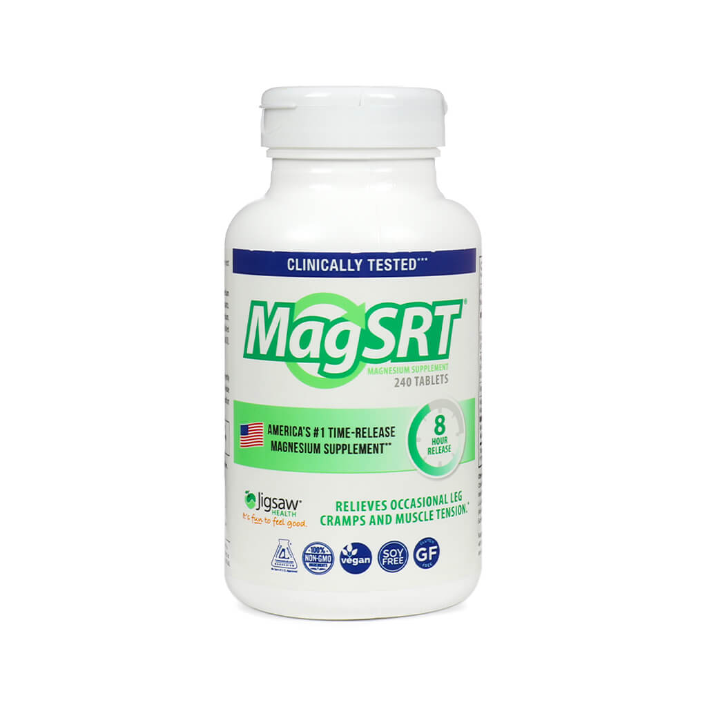 A white bottle of Jigsaw Health’s MagSRT magnesium supplement featuring a blue and green label that reads “Clinically Tested” and “America’s #1 Time-Release Magnesium Supplement.” The label highlights 240 tablets, an 8-hour release formula, and benefits like relieving occasional leg cramps and muscle tension.