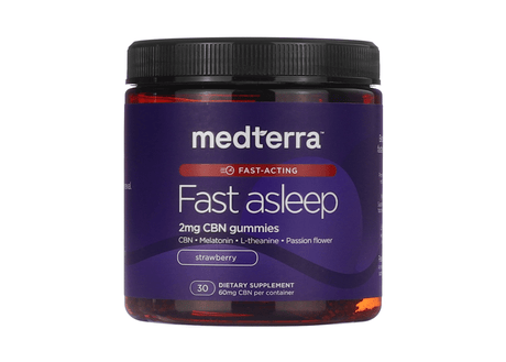 A jar of Medterra Fast Asleep gummies with a deep purple label and black lid. The label highlights 2mg of CBN per gummy, with added melatonin, L-theanine, and passion flower in a strawberry flavor. The container includes 30 gummies totaling 60mg CBN.