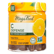 Bright orange jar of MegaFood C Defense daily immune support gummies with sliced orange imagery, labeled as a source of Vitamin C. Features 70 gummies (35 servings) in a tangy citrus flavor, made with organic oranges and certified Non-GMO Project Verified.