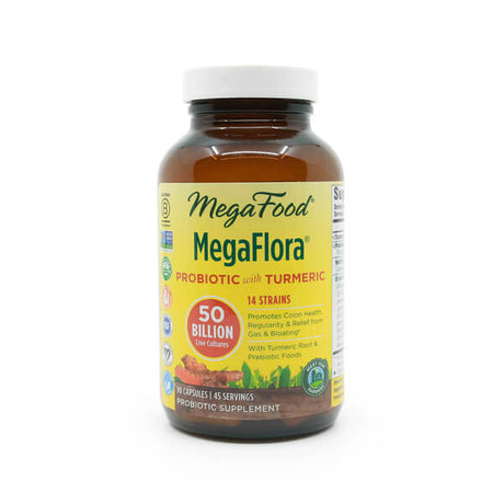 MegaFood MegaFlora Probiotic with Turmeric in an amber glass bottle with a white cap, labeled with "50 billion live cultures" and "14 strains." The label includes health claims for digestive relief and features images of turmeric and plant roots, indicating 90 capsules and 45 servings.