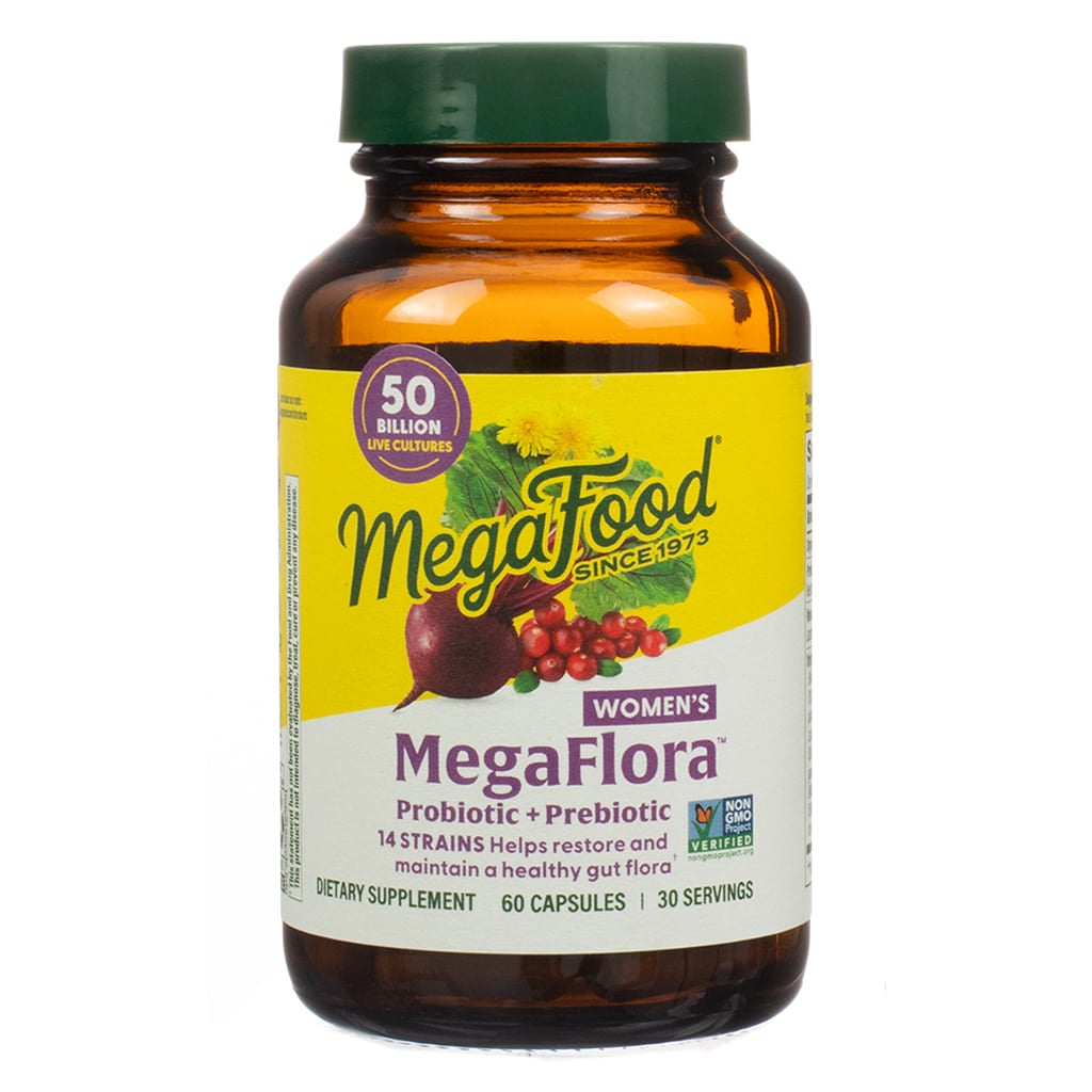 Amber bottle of MegaFood Women’s MegaFlora Probiotic + Prebiotic, containing 60 capsules (30 servings). The label features bold yellow and purple text with an image of beets, cranberries, and leafy greens, and promotes “50 billion live cultures” and “14 strains” to help restore and maintain a healthy gut flora.
