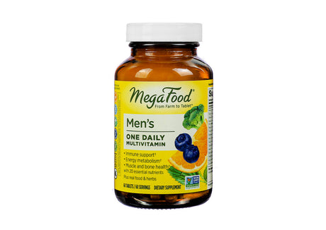 MegaFood Men’s One Daily Multivitamin in an amber glass bottle with a white cap, featuring a label that highlights immune support, energy metabolism, and muscle and bone health. The label includes images of blueberries, orange slices, and broccoli, and notes that the bottle contains 60 tablets.