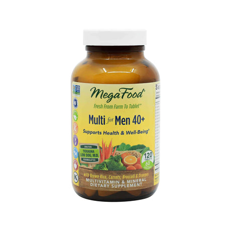 MegaFood Multi for Men 40+ supplement bottle with 120 tablets, featuring a white cap and amber glass. The label highlights support for health and well-being, with images of carrots, broccoli, orange slices, and greens, and notes formulation by Dr. Tieraona Low Dog.