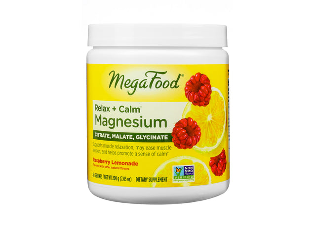 MegaFood Relax + Calm Magnesium powder in a Raspberry Lemonade flavor, packaged in a white tub. The label features raspberries and lemon slices with supplement details emphasizing citrate, malate, and glycinate as key forms of magnesium. Designed to ease tension and support calm.
