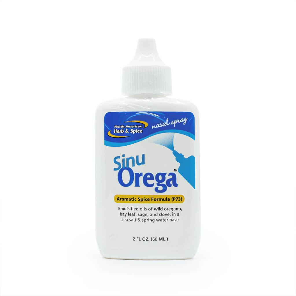 White 2 fl oz bottle of North American Herb & Spice SinuOrega nasal spray, featuring a blue and yellow label. Contains an aromatic spice formula (P73) with emulsified oils of wild oregano, bay leaf, sage, and clove in a sea salt and spring water base.
