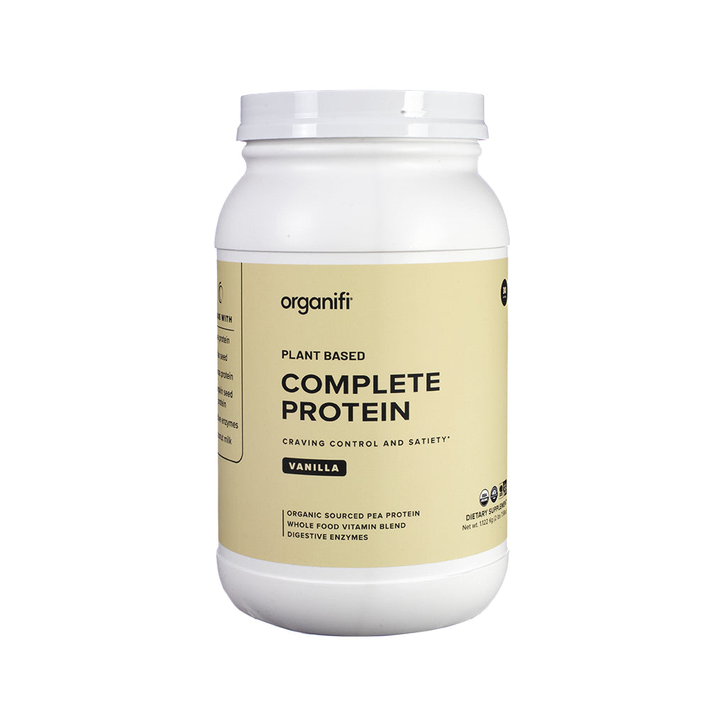 Organifi Complete Protein Vanilla flavor, front label featuring plant-based protein shake mix with digestive enzymes, multivitamins, and smooth vanilla flavor in a white and gold pouch.