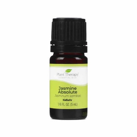 A small brown glass bottle with a black cap. The label is lime green and white with "Plant Therapy Essential Oils," "Jasmine Absolute," and "Jasminum sambac." It includes "KidSafe."