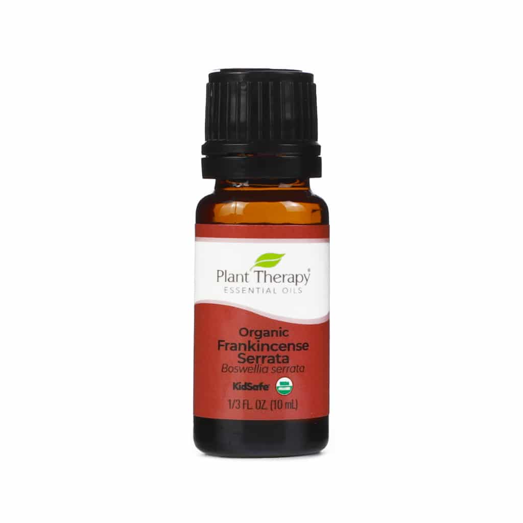 A 10mL amber glass bottle of Plant Therapy Organic Frankincense Serrata Essential Oil with a black cap. The label is white and red, displaying the Plant Therapy logo, the product name, and botanical name Boswellia serrata. It also includes "KidSafe" and the USDA organic certification badge.
