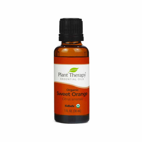 Plant Therapy Organic Sweet Orange Essential Oil, 30 mL bottle. The amber glass bottle has a black cap and a white and orange label displaying the USDA Organic seal and "KidSafe" certification. This citrusy oil is known for its uplifting and refreshing aroma.