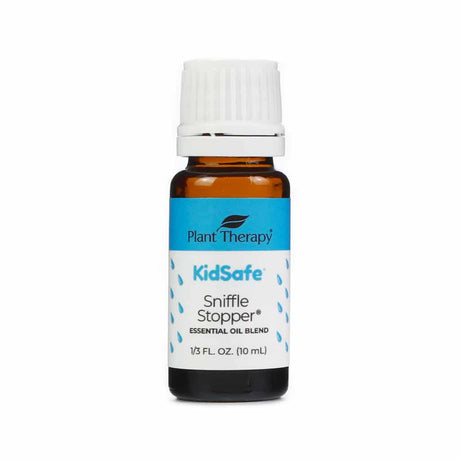 Plant Therapy Sniffle Stopper KidSafe Essential Oil Blend, 10 mL bottle. The amber glass bottle has a white cap and a blue and white label with small raindrop illustrations. Designed to support clear breathing and congestion relief, part of Plant Therapy's KidSafe line.
