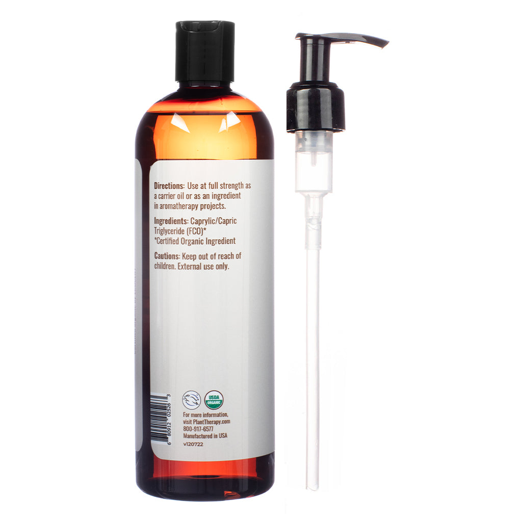 Back of Plant Therapy Organic Fractionated Coconut Carrier Oil 16 fl oz displaying usage directions, ingredient list, and safety warnings. The label states the oil is made from certified organic Caprylic/Capric Triglyceride and is for external use only.