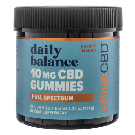A black plastic jar of PlusCBD Daily Balance 10mg CBD Gummies, displaying the front label with product branding. The label highlights full-spectrum hemp extract, cherry mango flavor, and a CBD potency of 10mg per gummy. The jar contains 30 gummies with a net weight of 4.34 oz (123g).