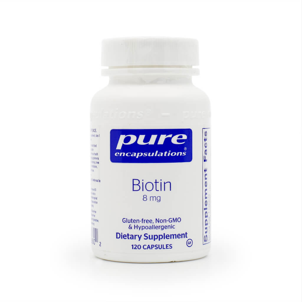 White bottle of Pure Encapsulations Biotin, a dietary supplement containing 8 mg per serving and 120 capsules. The label highlights that it is gluten-free, non-GMO, hypoallergenic, and suitable for those with dietary sensitivities.
