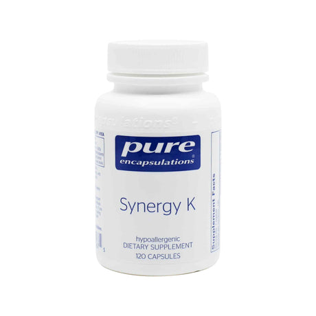 A white bottle of Pure Encapsulations "Synergy K" dietary supplement containing 120 capsules. The label indicates it is hypoallergenic and formulated for nutritional support.