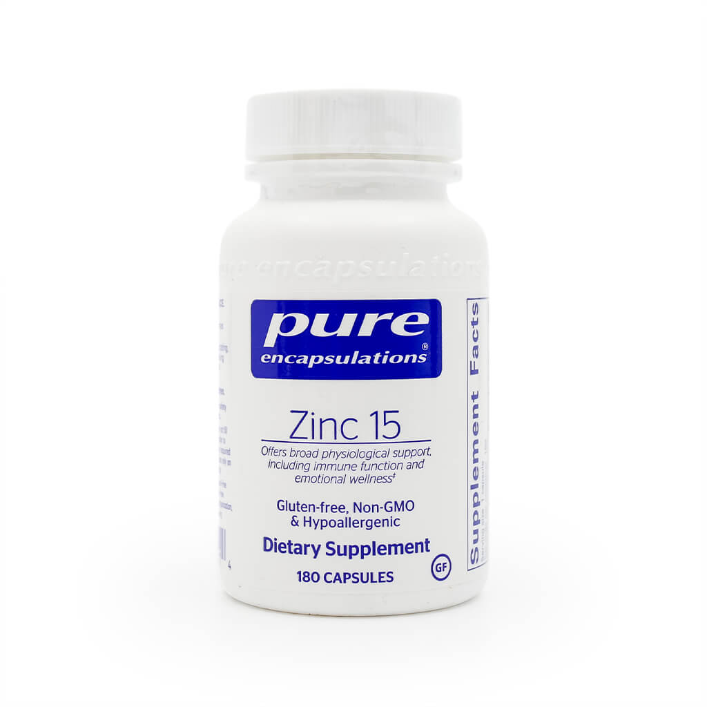 White bottle of Pure Encapsulations Zinc 15 dietary supplement. The label highlights support for immune function and emotional wellness, and notes it is gluten-free, non-GMO, hypoallergenic, with 180 capsules included.