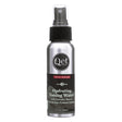 A silver spray bottle of Qēt Botanicals Hydrating Toning Water with Lavender, Rose, Pomegranate, and Probiotic Peptides. The black label displays the Qēt Botanicals logo, with the product name in white text below. A red banner at the top indicates it's part of the Facial Skincare line, labeled as Step 3 in a skincare routine. The bottle has a black spray nozzle with a clear cap, and the volume is listed as 2.7 oz (80ml).