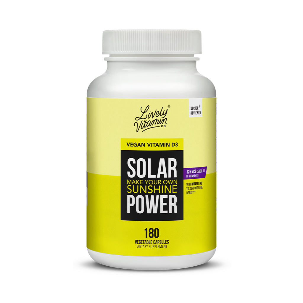 Lively Vitamin Co. Solar Power 180 vegetable capsules dietary supplement bottle with a bright yellow and black design. The label highlights 'Vegan Vitamin D3' with a potency of 125 mcg (5000 IU) and promotes 'Make your own sunshine' along with Vitamin K2 for bone density support.