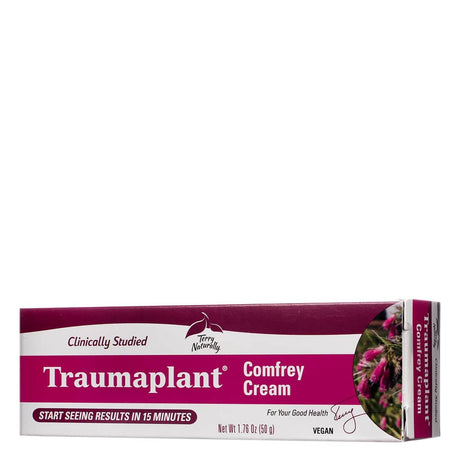 Box of Terry Naturally Traumaplant® Comfrey Cream, 50g (1.76 oz), with a horizontal design. Highlights benefits like "Clinically Studied" and "Start Seeing Results in 15 Minutes," with an image of pink comfrey blossoms on the right side. Marked vegan and signed "For Your Good Health" by Terry.