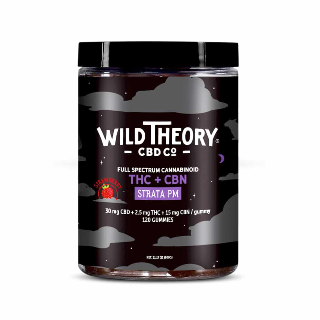 A clear plastic jar with a black lid labeled "Wild Theory CBD Co Strata PM THC + CBN Full Spectrum Cannabinoid Gummies" in strawberry flavor. Each gummy contains 30 mg CBD, 2.5 mg THC, and 15 mg CBN; the jar holds 120 gummies and features a night sky design with clouds.