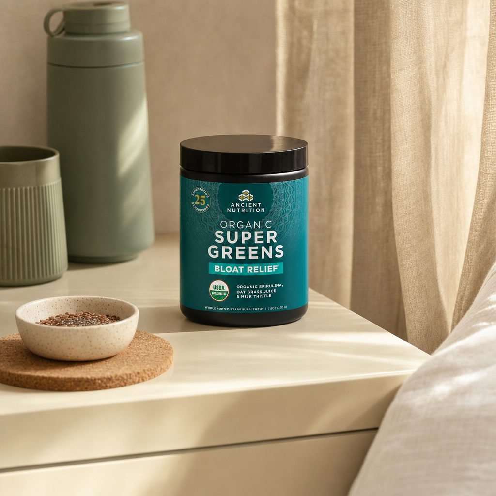 Ancient Nutrition SuperGreens Bloat Relief powder with lifestyle benefits icons