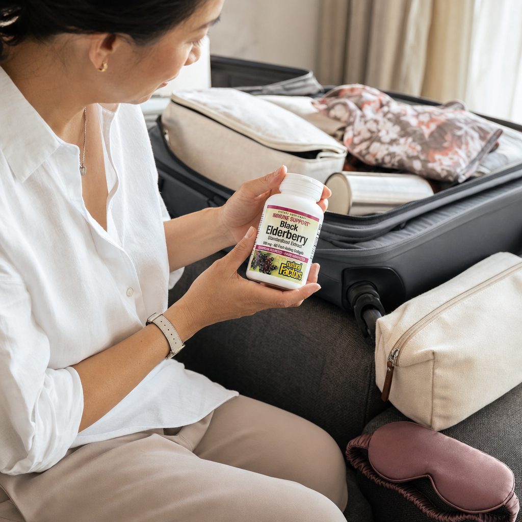 Natural Factors Black Elderberry Extract 100 mg softgels displayed beside the bottle