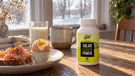 Lively Vitamin Co. Solar Power vitamin D3 on a breakfast table by a frosted winter window