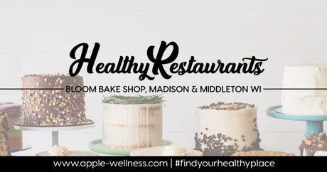 A promotional image for Bloom Bake Shop in Madison and Middleton, WI, highlighting "Healthy Restaurants" with an assortment of decorated cakes in the background.