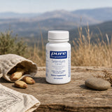 Pure Encapsulations Selenium Citrate 200 mcg bottle with capsules on a clean countertop