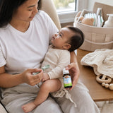 Carlson Baby's Super Daily D3 Drops 400 IU bottle shown with infant feeding essentials