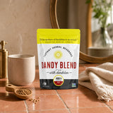 Dandy Blend Instant Herbal Beverage pouch with prepared hot coffee-style drink