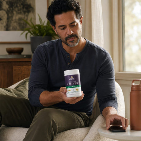 Ancient Nutrition Active Peptides Cortisol Support bottle and capsules arranged for a daily routine
