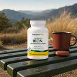 NaturesPlus Chewable Iron with Vitamin C & Herbs bottle with cherry-flavored chewable tablets