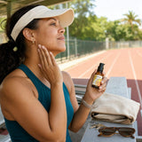Mad Hippie Daily Protective Serum SPF 30+ bottle with product texture for facial use