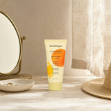 Woman applying Mad Hippie Luminizing Facial SPF in a bright skincare routine scene