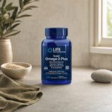 Life Extension Super Omega-3 Plus bottle with omega-3 softgels on a clean tabletop
