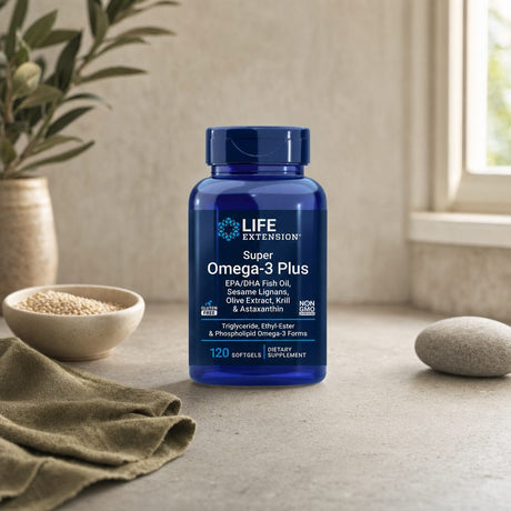 Life Extension Super Omega-3 Plus bottle with omega-3 softgels on a clean tabletop